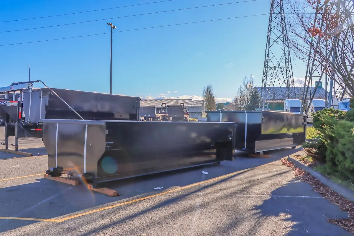 Roll-off dumpster ready for waste disposal at job site for 12 Yard Dumpster Rental in Prospect Park